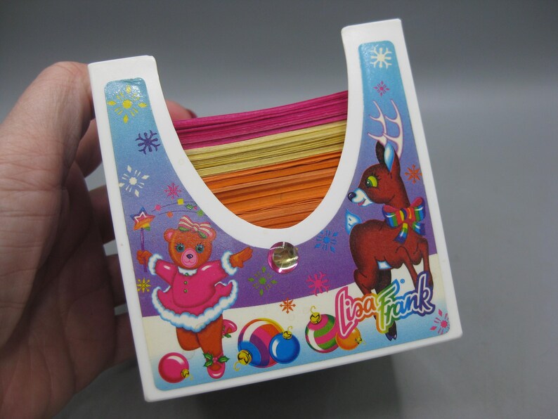 May include: A set of three ceramic mugs with a speckled, matte finish. The mugs are in shades of cream, light brown, and dark brown. Each mug has a simple, minimalist design and a rounded handle.