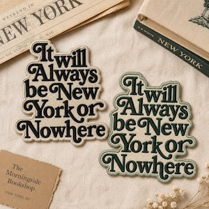 May include: Two embroidered patches featuring the text It will Always be New York or Nowhere. One patch has black lettering on a cream background, while the other has dark green lettering on a cream background with a matching green border.