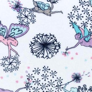 May include: White fabric with a repeating pattern of fairies and dandelions. The fairies are in shades of pink, purple, and blue, with delicate wings. Dandelions are black and white.