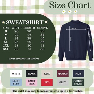 May include: A size chart for a sweatshirt, with measurements in inches. The chart includes sizes S to 3XL, with corresponding width, length, and sleeve measurements. Color options include white, black, navy, and more. A navy sweatshirt is shown.