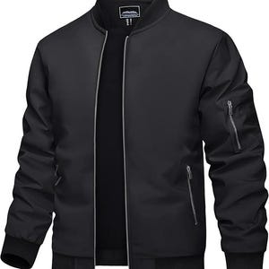 May include: A black bomber jacket featuring a ribbed collar, cuffs, and hem. The jacket has a full-length silver-toned front zipper, two slanted side pockets with silver zippers, and a utility pocket on the left sleeve with a silver zipper.