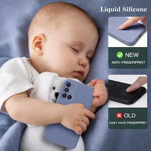 May include: A sleeping baby holding a light blue phone case. The case is made of liquid silicone and is anti-fingerprint. The image also shows a comparison with an older case that easily shows fingerprints.