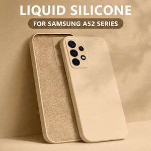 May include: Beige liquid silicone phone case for Samsung A52 series. The case is shown with a matching interior lining. The phone case has a camera cutout with multiple lenses. The text "LIQUID SILICONE" and "FOR SAMSUNG A52 SERIES" is visible.