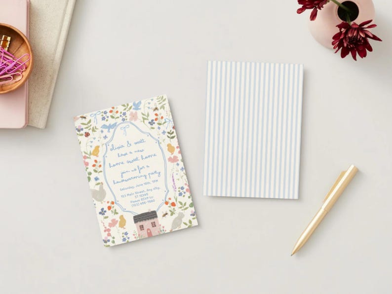 May include: A housewarming party invitation with floral and bird illustrations, featuring the text "Welcome & well, love a new home, sweet home". A matching notepad with blue and white vertical stripes and a gold pen are also present.