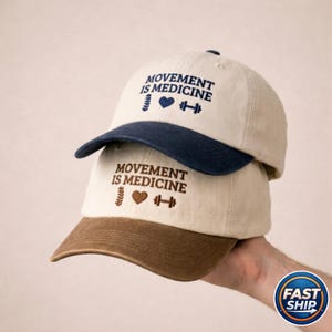Embroidered Movement is Medicine Trucker Hat