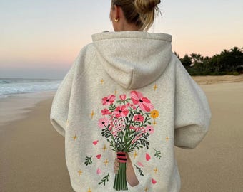 Felpa con cappuccio floreale "Gift Giving" di Dandy Worldwide, felpa con cappuccio floreale ricamata in stile disegnato a mano