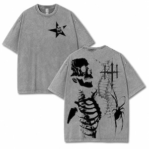 May include: Gray t-shirt with a black star and skull graphic on the front. The back features a skeleton, spider, and cross design. The shirt has a vintage, washed look.