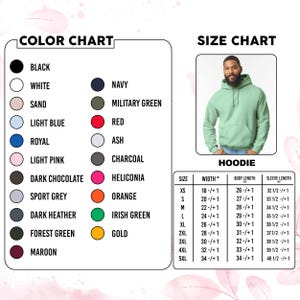 May include: A colour chart listing black, white, sand, light blue, royal, light pink, dark chocolate, sport grey, dark heather, forest green, maroon, navy, military green, red, ash, charcoal, heliconia, orange, irish green, and gold.