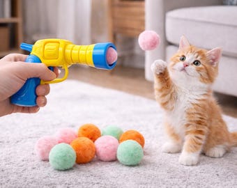 Lanzador de juguetes interactivo para gatos con pompones / Juguete de enriquecimiento para juegos de interior