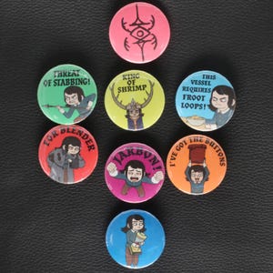 May include: A selection of vibrant, circular badges with cartoon graphics and text. The badges display diverse designs, including phrases such as "Threat of Stabbing!" and "King of Shrimp."