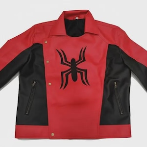 May include: Red and black jacket with a black spider emblem on the front. The jacket has a collared neckline, long sleeves, and two zippered pockets. The jacket is made of a smooth material and has a button closure.