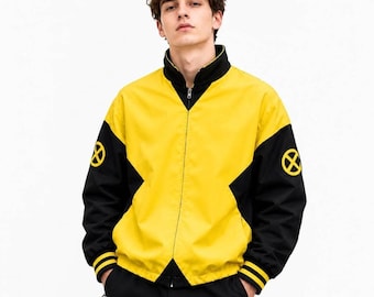 May include: A yellow and black zip-up jacket featuring a high collar and long sleeves with black cuffs. The jacket displays a prominent yellow X-Men logo on each sleeve. The design includes a central yellow panel with black side sections.