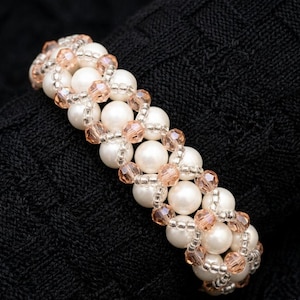 May include: A set of three ceramic mugs with a speckled, matte finish in cream, light grey, and dark grey. Each mug has a simple, minimalist design, suitable for coffee or tea.