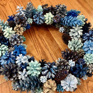 Hand Painted Pine Cone Wreath with Unique Embellishments