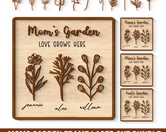 May include: A wooden sign with the text "Mom's Garden LOVE GROWS HERE" and three floral designs. Below the flowers are the names "joannie", "alex", and "william". Additional smaller signs are also visible. The text "MOMS GARDEN FRAME LASER CUT BUNDLE" is at the bottom.