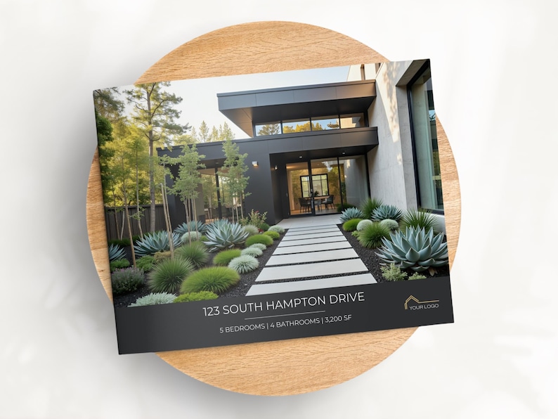 May include: A brochure featuring a modern home with a black exterior, a stone walkway, and lush landscaping. The brochure displays the address "123 South Hampton Drive" and property details. The brochure is placed on a wooden plate.