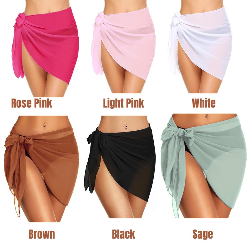 K&ouml;nnte beinhalten: Eine Kollektion von sechs kurzen, halbtransparenten Sarong-Wickelt&uuml;chern, die jeweils mit einem seitlichen Knoten versehen sind. Die T&uuml;cher sind in Rosarot, Hellrosa, Wei&szlig;, Braun, Schwarz und Salbeigr&uuml;n dargestellt, mit der jeweiligen Farbbezeichnung.