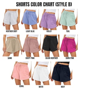 May include: Color chart of shorts in various colors, including heather grey, light blue, violet, teal, sand, dusty pink, black heather, dark pink, coral, white, and navy. The text "SHORTS COLOR CHART (STYLE B)" is at the top.