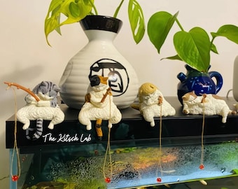 Den nyckfulla fiskekattens miniatyrsamling