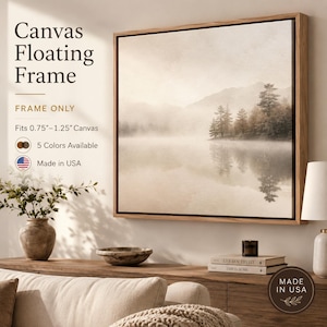 May include: A square wooden floating frame for canvas art, featuring a natural light brown finish. The frame is designed to fit canvases between 0.75 inches and 1.25 inches thick. Text on the image reads: Canvas Floating Frame, FRAME ONLY, Fits 0.75-1.25 Canvas, 5 Colors Available, Made in USA.