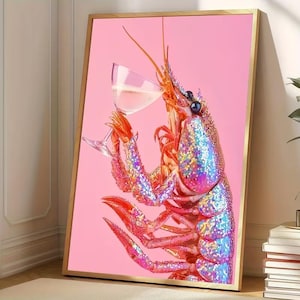 May include: A framed art print featuring a vibrant, glitter-covered lobster holding a glass of champagne against a pink backdrop. The lobster is depicted in shades of red, orange, and iridescent colors, creating a whimsical and eye-catching design.