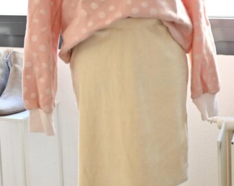 Mini Rock van Organic Baumwolle Cordnicki in roze en crème/beige.
