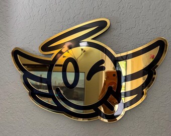 Espejo de pared acrílico dorado con diseño de ángel sonriente