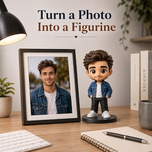 May include: A custom figurine of a person with brown hair wearing a blue denim jacket, white t-shirt, and black pants, standing next to a framed photograph of the same person. The text above reads Turn a Photo Into a Figurine.