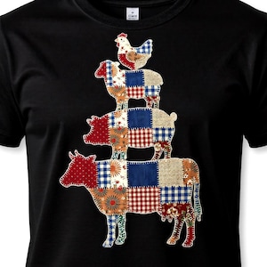 May include: Black t-shirt featuring a patchwork design of farm animals stacked on top of each other. The animals include a cow, pig, sheep, and chicken, each with a unique patchwork pattern in red, blue, and orange.