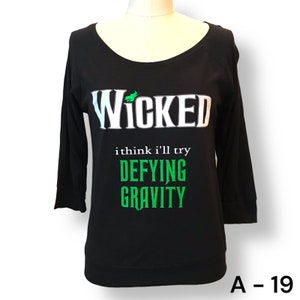  Wicked Broomstick Musical Musicals T-Shirt : Clothing, Shoes &  Jewelry