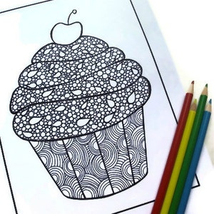 May include: Black and white cupcake coloring page with a cherry on top. The cupcake has a detailed design with various patterns. Colored pencils in red, yellow, green, and blue are placed on the right side of the page.