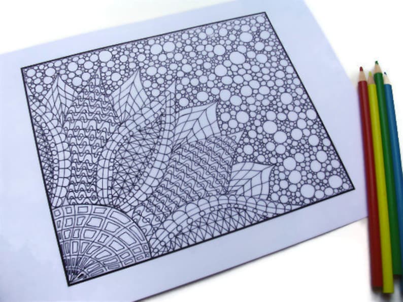 May include: Black and white adult coloring page with a floral design and bubble pattern. The page is accompanied by a set of red, yellow, green, and blue colored pencils, perfect for creative expression and relaxation.