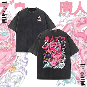 May include: Two charcoal gray t-shirts with a graphic design. One shirt features a small pink cartoon character on the chest. The other shirt has a large pink cartoon character with Japanese text on the back. The Wash Club is printed on the side.