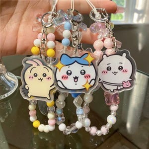 Kawaii mobilrem för henne, Chiikawa telefonrem, anime telefonberlock, kamerarem, telefonkedja med snodd, armbandsnyckelring