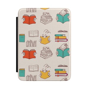 May include: A cream-colored e-reader cover with a repeating pattern of illustrated books in various colors. The design includes stacks of books, open books, and figures reading books. A black strap is on the left side.