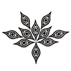 May include: An embroidered patch featuring a cluster of nine stylized, almond-shaped eyes arranged in a symmetrical, branching pattern. Each eye is rendered in high-contrast black and white thread, with a solid black pupil and white iris.