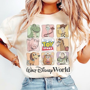 May include: A set of three ceramic mugs with a speckled, matte finish in cream, light grey, and dark grey. Each mug has a simple, minimalist design, suitable for coffee or tea.