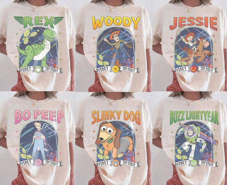May include: Cream-coloured t-shirts featuring characters from Disney's Toy Story. Each shirt displays a different character: Rex, Woody, Jessie, Bo Peep, Slinky Dog, and Buzz Lightyear, with the Disney and Toy Story logos.