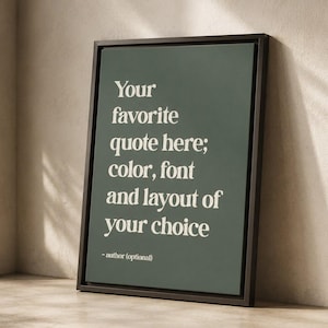 May include: A rectangular framed wall art piece featuring a dark sage green background with white text that reads: Your favorite quote here; color, font and layout of your choice - author (optional). The frame is a thin, dark brown material.
