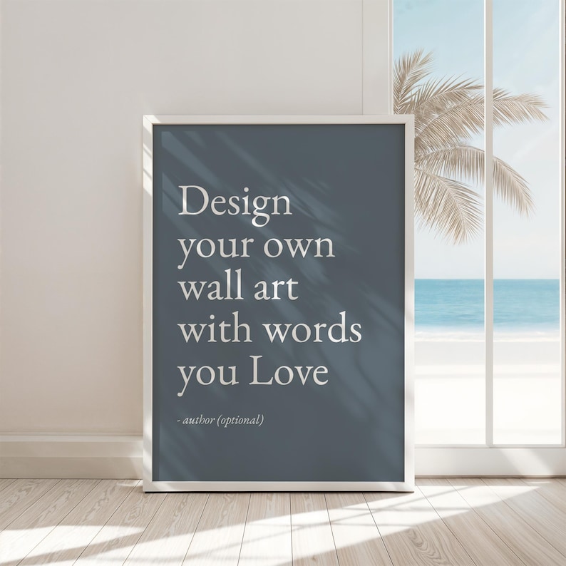 Może przedstawiać: Prostokątny wydruk ścienny w białej ramie z ciemnoniebieskim tłem i białym tekstem szeryfowym o treści: Design your own wall art with words you Love - author (optional). Wydruk jest prezentowany w orientacji pionowej.