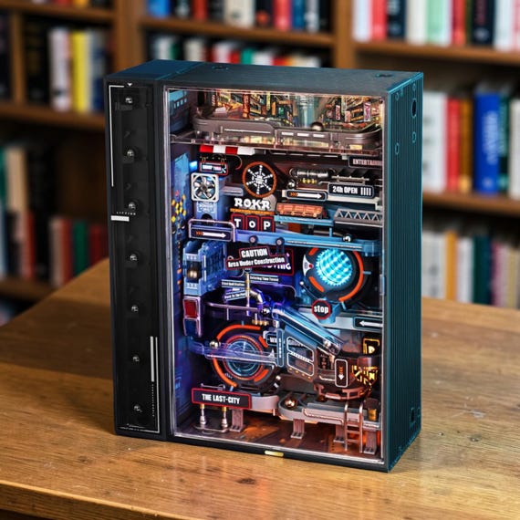 A jaw-dropping cyberpunk-themed LED-lit marble run machine that's part kinetic sculpture, part dystopian diorama — nothing else on the market looks like this.