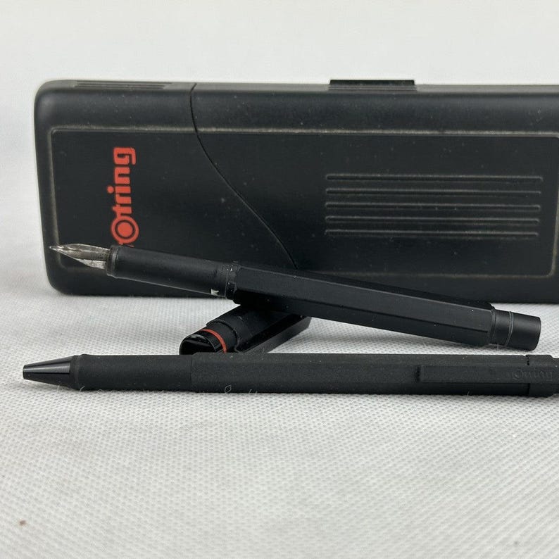 Rotring 600 Newton Fountain Pen & Ballpoint Pen in black color with original case, the pens are not caped