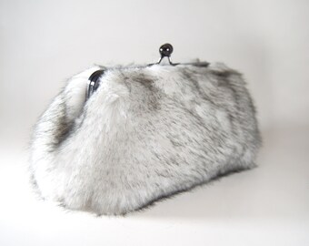 white fluffy clutch