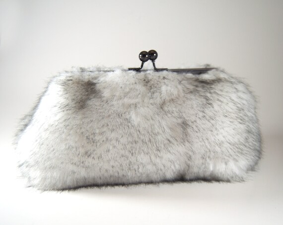 white fluffy clutch