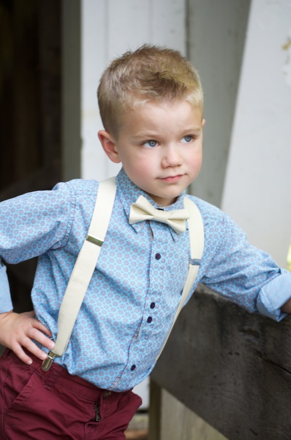 cream bow tie and suspenders