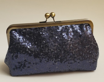 Navy top sparkly bag