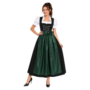 May include: A black dirndl dress featuring a white blouse with puffed sleeves, a square neckline, and a lace-up bodice with silver-toned eyelets. The dress includes a long, solid dark green apron tied at the waist over a black skirt.