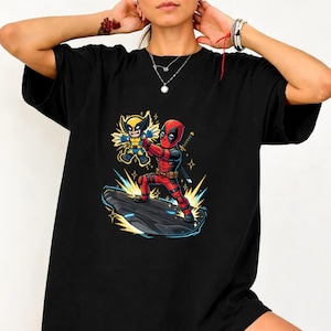 Unleash your inner anti-hero with this bold and playful Deadpool & Wolverine mashup T-Shirt! 🖤🔥 Combining the chaotic humor of Deadpool with the fierce energy of Wolverine, this design delivers a fun twist—perfectly blended with a nostalgic nod to The Lion King theme. 🦁