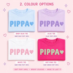 May include: Four t-shirts in baby blue, lilac, white, and hot pink, each with the name "PIPPA" in a puffy, textured font and a heart. The text "2. COLOUR OPTIONS" is at the top. The bottom text reads "SOFT PUFF VINYL &bull; BRIGHT COLOURS &bull; MADE TO LAST".