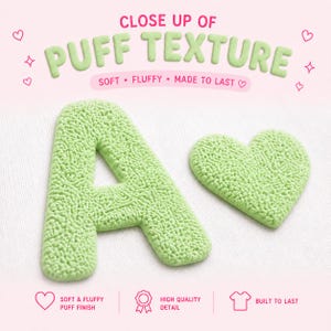 May include: Close-up of a light green letter "A" and a heart-shaped object with a textured, puffy finish. The text "CLOSE UP OF PUFF TEXTURE" is at the top, with "SOFT &bull; FLUFFY &bull; MADE TO LAST" below it. The image highlights the soft and fluffy texture.